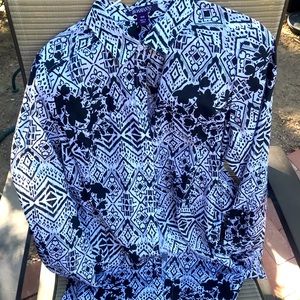 Elegant woman’s blouse. Fun to wear with jeans or dress skirt. Easy care